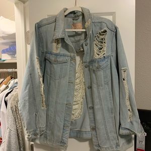 Distressed light denim jacket